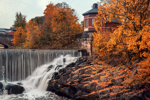 Waterfall in Vanhankaupunginkoski, Helsinki, Finland, autumn.