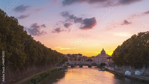 Paning Timelapse of Rome, Vatican, St Peter Basilica and St Angelo Bridge crossing Tiber River in the city center of Rome Italy , historical landmarks of the Ancient Rome , travel destination.