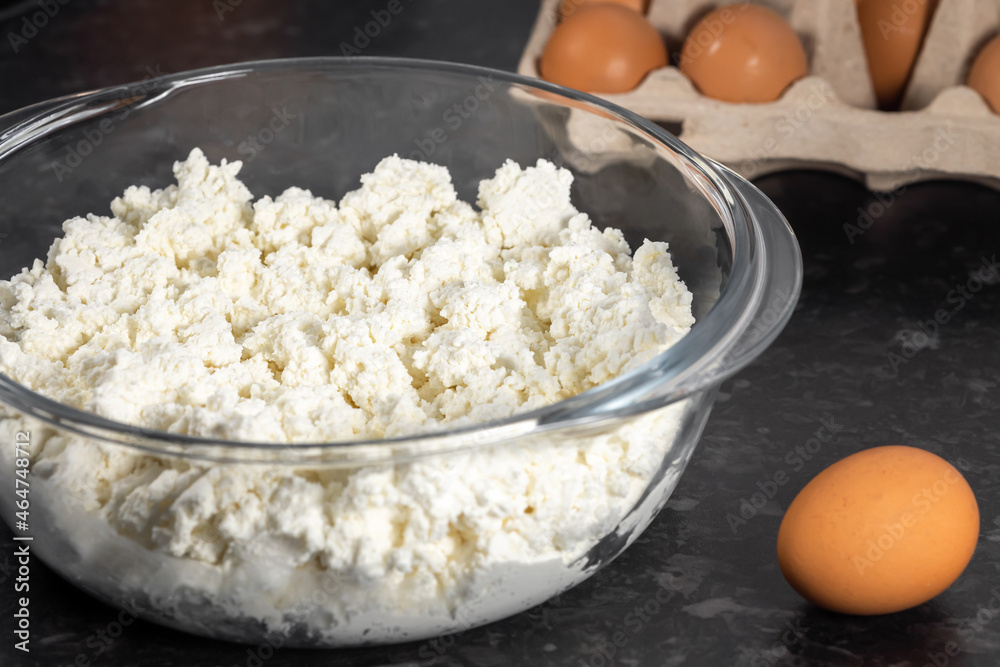 Preparing dough for curd fritters, curd and eggs, selective focus Preparing dough for curd fritters, curd and eggs, selective focus