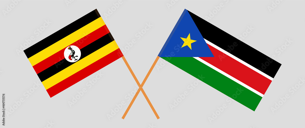 Crossed flags of Uganda and South Sudan. Official colors. Correct proportion