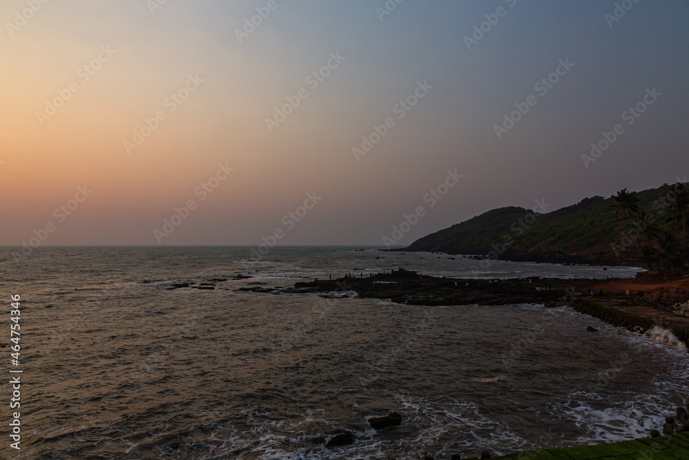 インド　ゴア州のアンジュナのビーチと夕焼け空