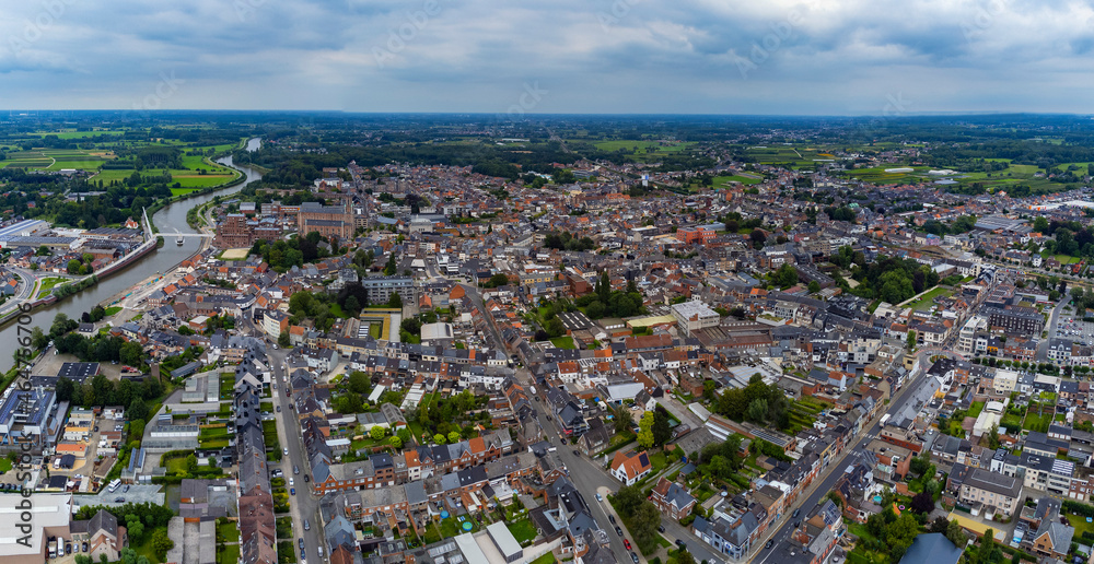 Aerial view from downtown of the city Wetteren in Belgian on a cloudy afternoon in summer
