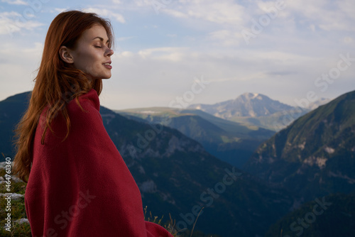 woman with red plaid on nature in the mountains vacation adventure © VICHIZH