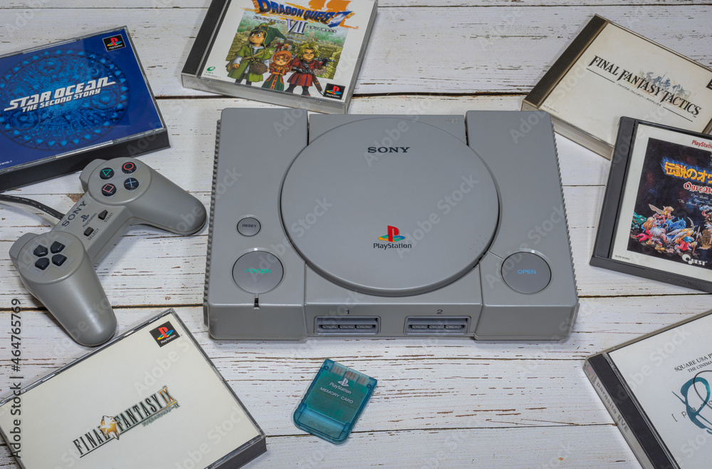 Fukuoka, Japan - october 24, 2021 : original sony playstation 32-bit home video game console released in 1994 with some games and controller Stock-foto | Adobe Stock