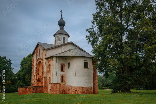 View of the Church of St. Paraskevi (Paraskevy Pyatnitsy na Torgu) on the territory of Yaroslavovo Dvorishche on a cloudy summer day, Veliky Novgorod, Russia