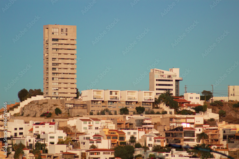 panoramic view of buildings on the top of a hill