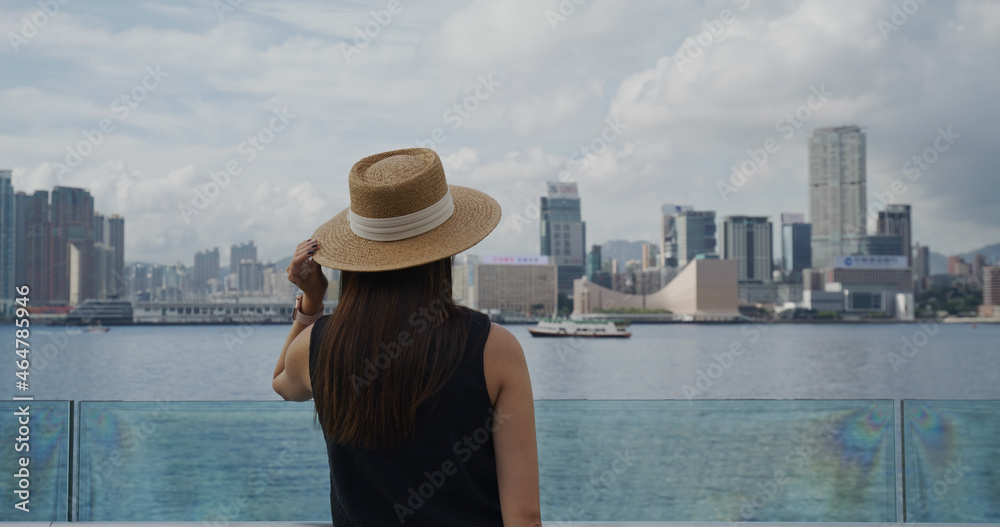 Woman look at the Hong Kong Victoira harbor