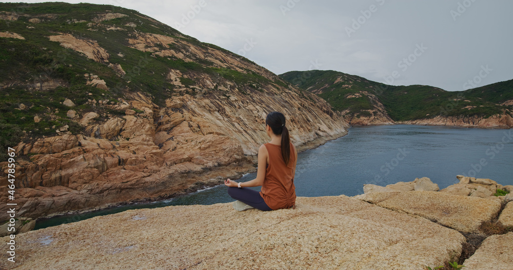 Woman do yoga on Po Toi island