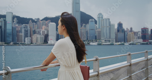 Woman look at the city of Hong Kong © leungchopan