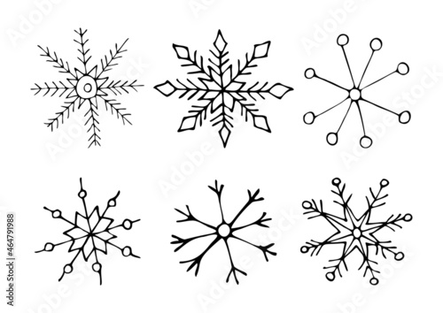 A hand-drawn set of snowflakes of different shapes.