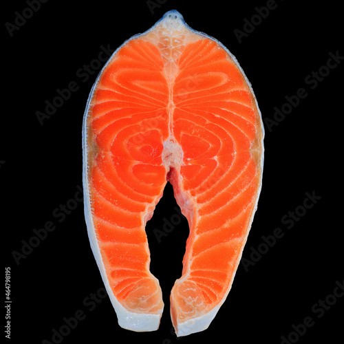 Fresh Raw Salmon Red Fish Steak isolated on a black Background. With clipping...