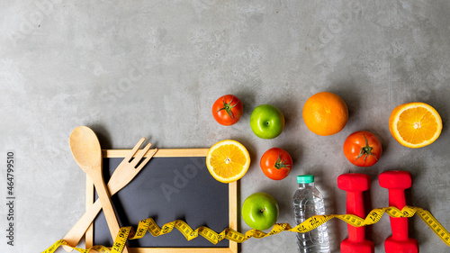 Diet Health eat and food for lifestyle health concept. Sport exercise workout and fresh fruit and measuring tape with backboard for fitness style. Nutrition Healthy Lifestyle Concept