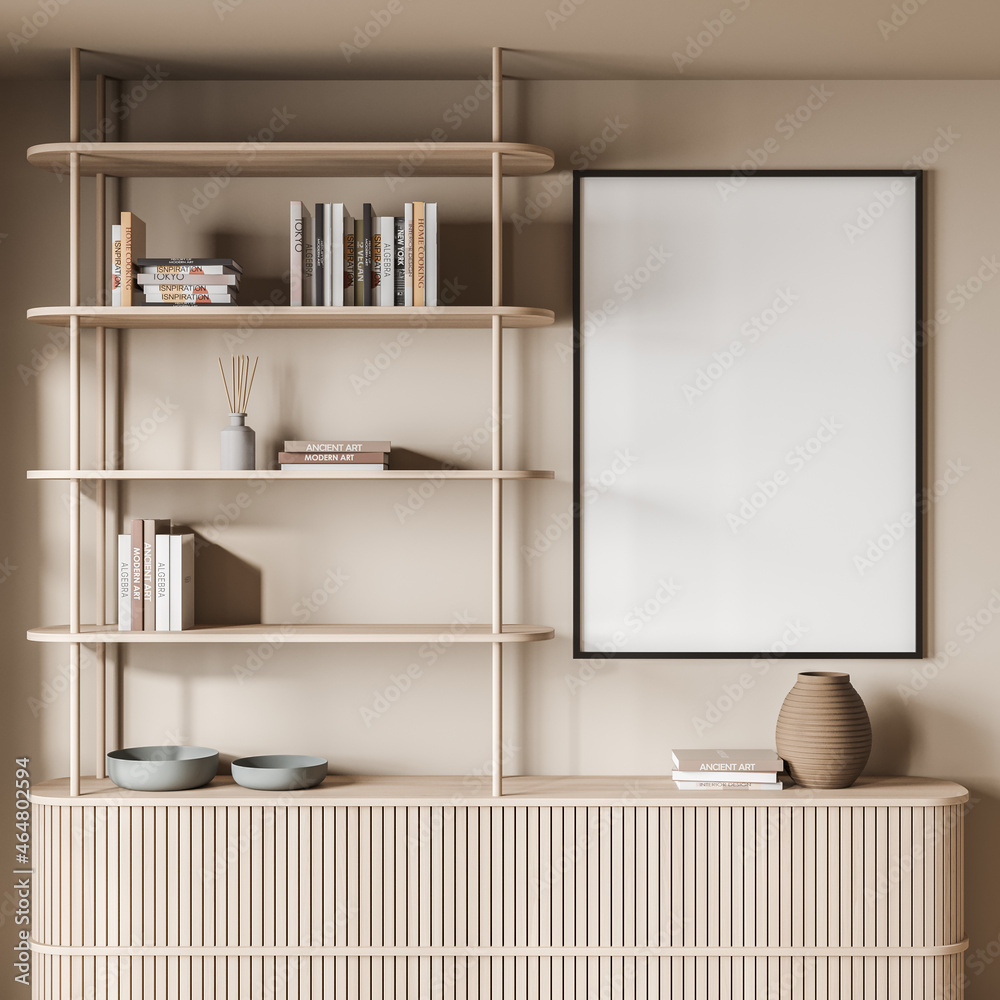 Empty canvas on beige wall with stylish living room shelving Empty canvas on beige wall with stylish living room shelving
