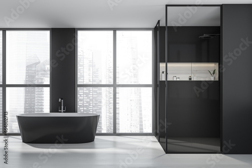 Dark bathroom interior with bathtub  shower  panoramic window