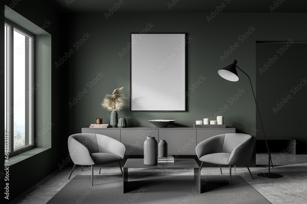 Dark green living room with empty canvas and two grey armchairs