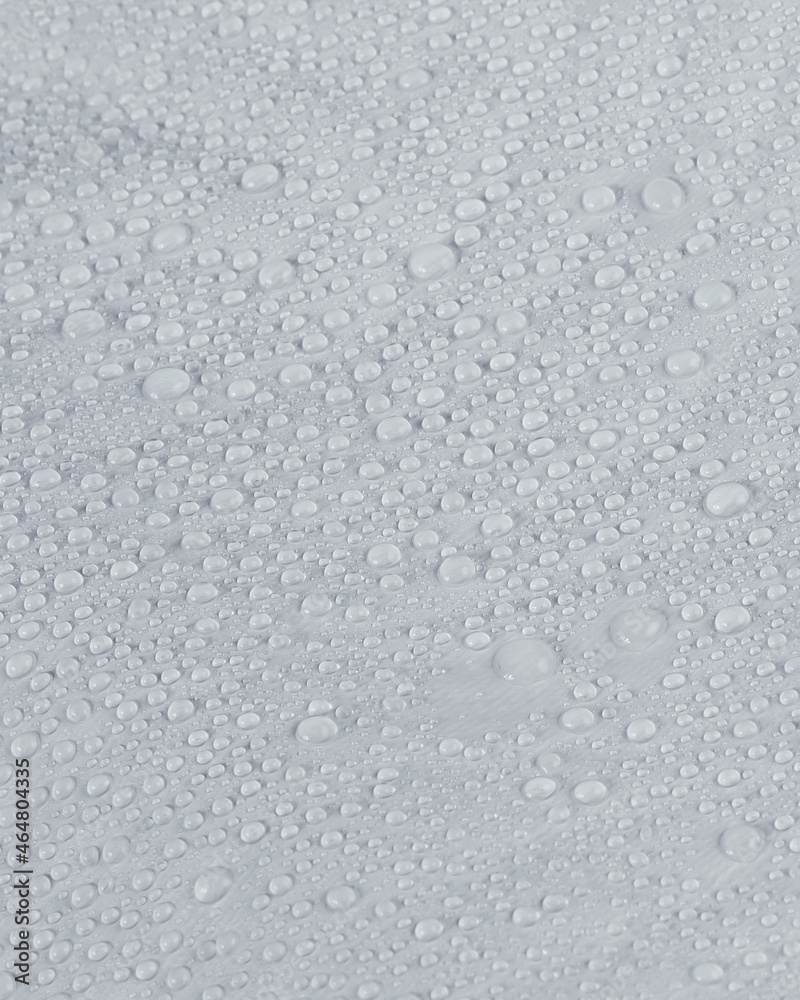 waterproof mattress cover. fragment with water waterproof mattress cover. fragment with water