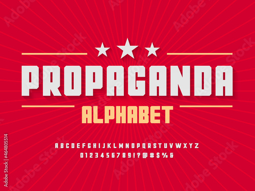 Propaganda Retro style alphabet design with uppercase, numbers and symbols photo