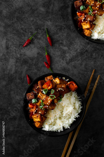 Vegan savoury and spicy tofu bowl photo