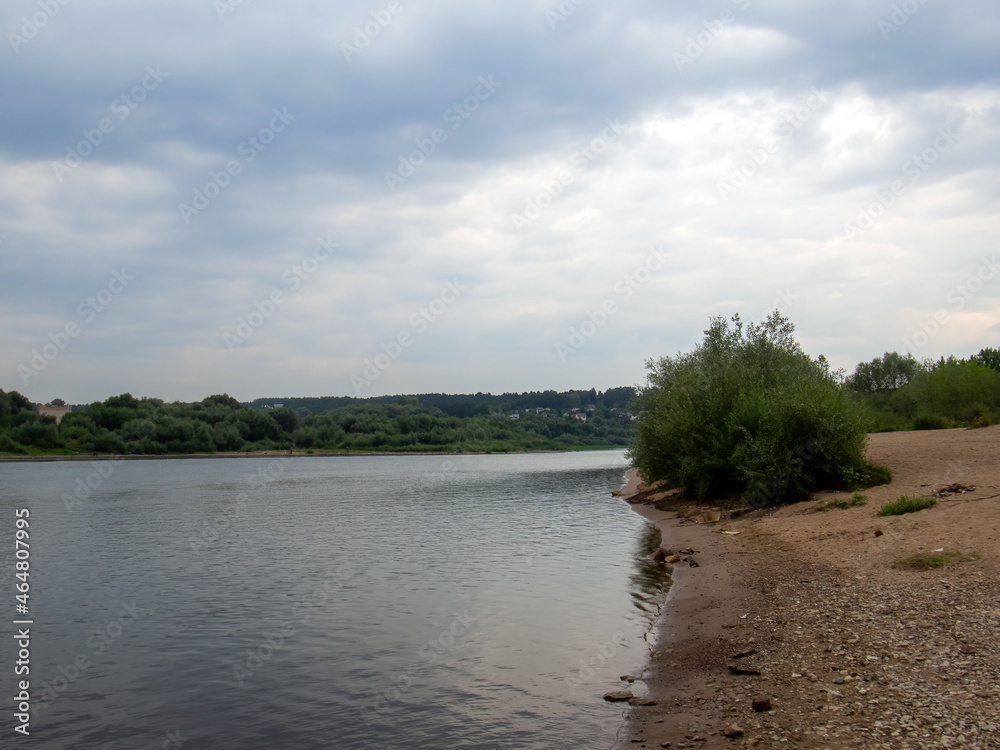 river bank on a cloudy day