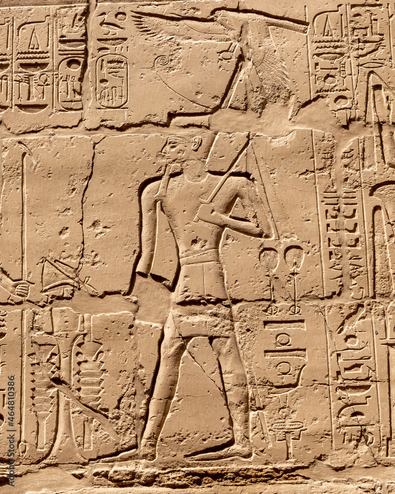 Ancient Egyptian murals and writings on the stone walls of the Karnak Temple in Luxor Ancient Egyptian murals and writings on the stone walls of the Karnak Temple in Luxor