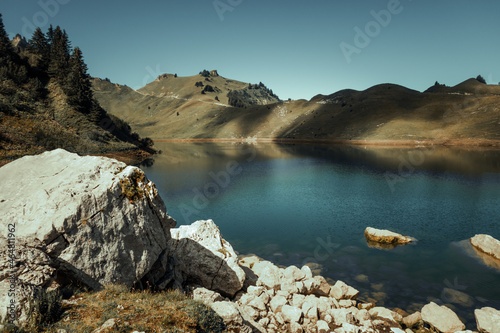 Lac De Lessy and Mountain landscape at sunrise in The Grand-Bornand  France