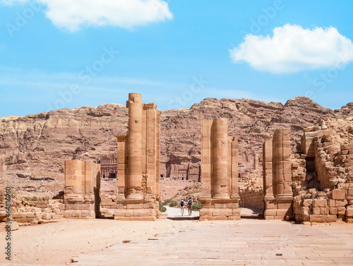View with The Colonnaded Street and Temenos gate in the ancient city of Petra, Jordan. Street Facade cobble road in Petra.
