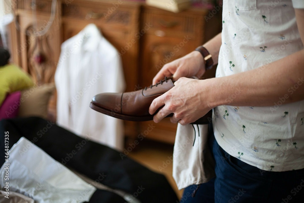 Fototapeta premium man groom getting ready for wedding