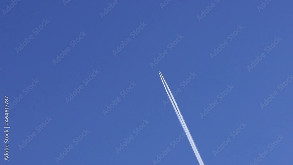 airplane contrail against blue sky
airplane contrail against blue sky