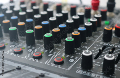 Sound and audio mixer console with buttons equipment.