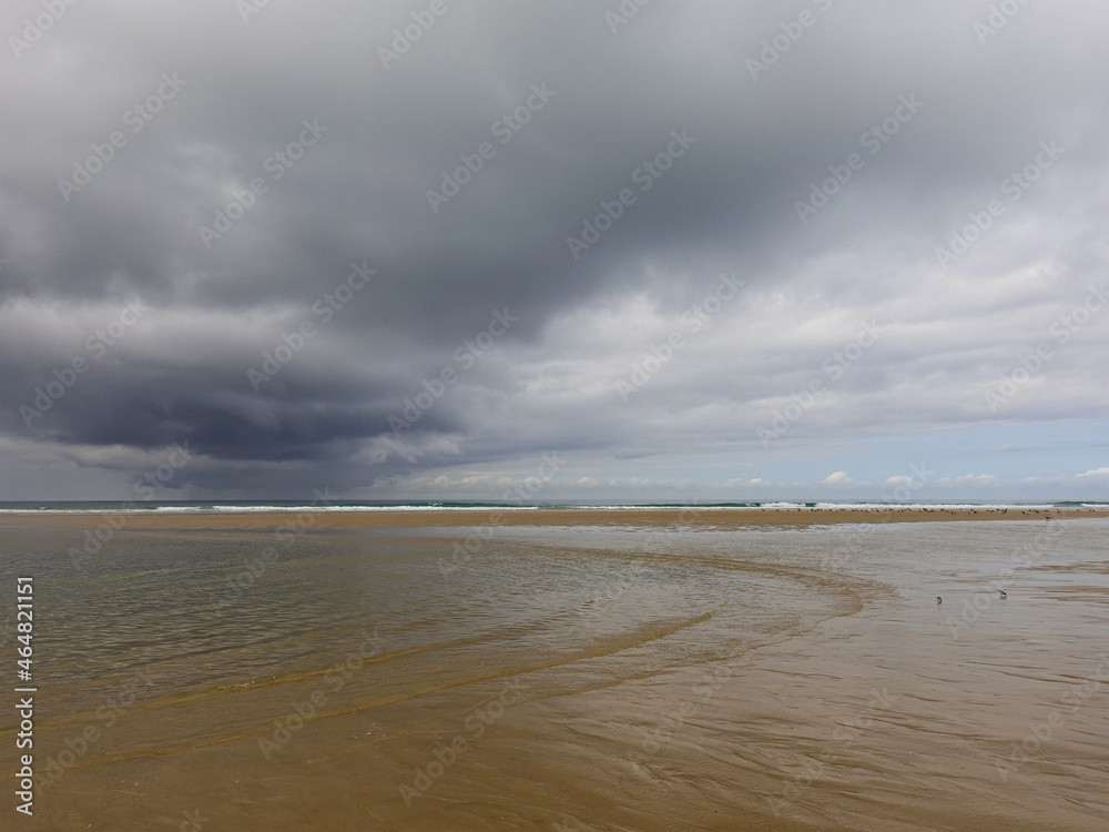 Arrival of a storm on the shore of a beach in the Landes. Moliets.