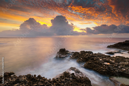 Seascape with a stormy sky during sunrise.