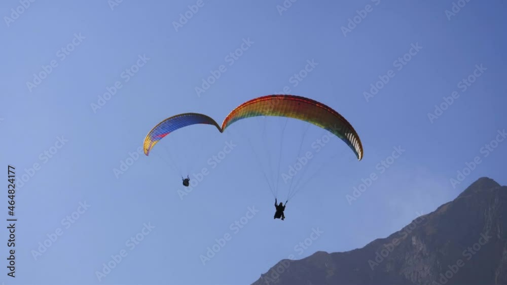 adventure sports video - paragliders flying over mountains on a beautiful sunny day. popular paragliding regions in Europe. adventure sports video - paragliders flying over mountains on a beautiful sunny day. popular paragliding regions in Europe.