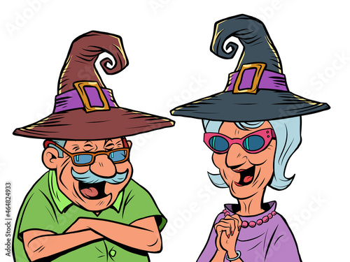 An old man and an old women couple in halloween hats laugh. love and friendship
