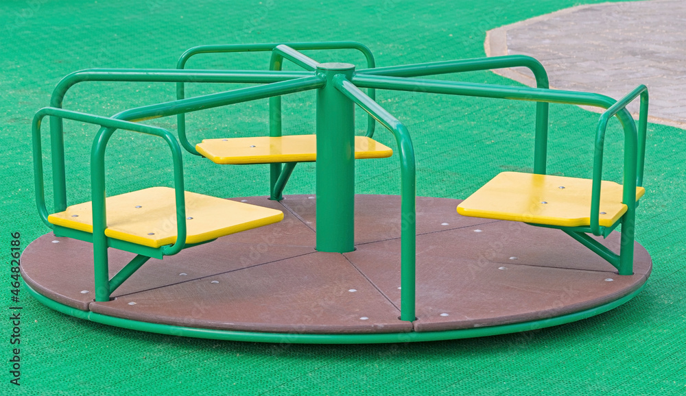 Steel carousel in children s playground Steel carousel in children s playground