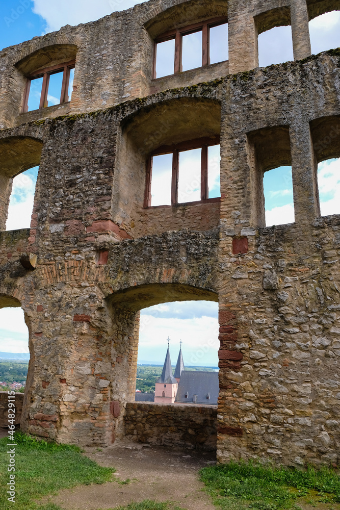 The ruins of the castle Landskrone in Oppenheim, Rheinhessen, Germany. Gothic Katarinenkirche in the window opening. Vertical image.