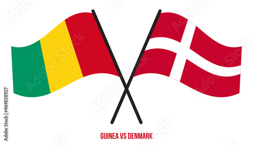 Guinea and Denmark Flags Crossed And Waving Flat Style. Official Proportion. Correct Colors.