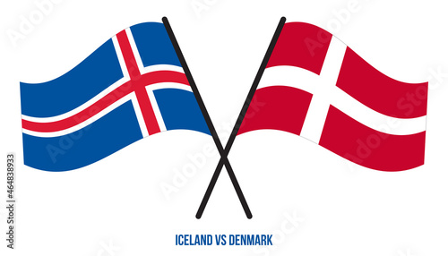 Iceland and Denmark Flags Crossed And Waving Flat Style. Official Proportion. Correct Colors.