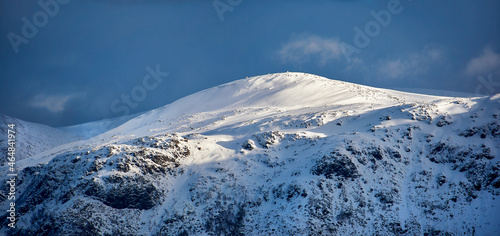Panorama of Sula mountain basking in some winter light, Norway photo