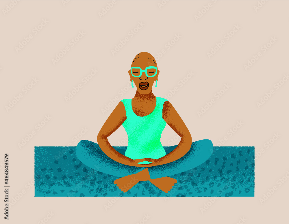 Older lesbian woman mediating on a yoga mat Older lesbian woman mediating on a yoga mat