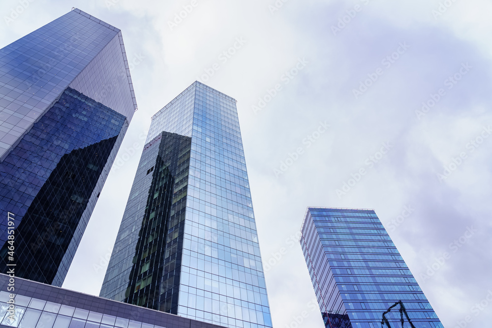 Glass and steel skyscrapers over stormy cloudy sky. Tallinn Estonia. Glass and steel skyscrapers over stormy cloudy sky. Tallinn Estonia.
