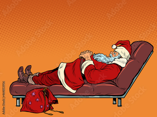 Santa Claus is sleeping on the couch. Christmas night. Rest after the holidays