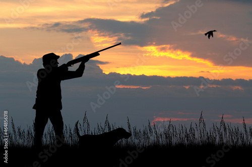 illustration of hunters at sunset