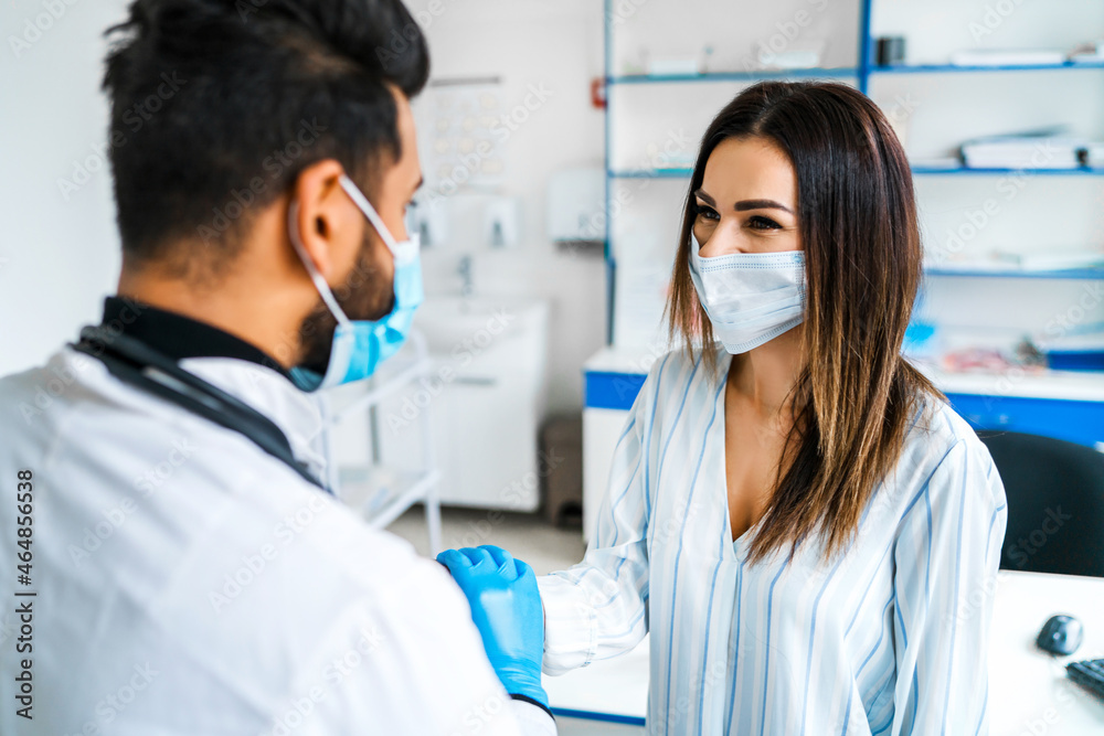 A smiling patient communicates with a doctor after vaccination, a healthy person, safe vaccination A smiling patient communicates with a doctor after vaccination, a healthy person, safe vaccination