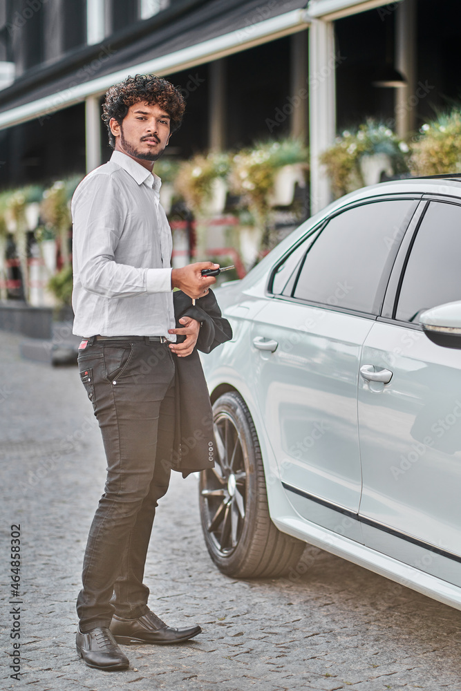 Indian businessman bought a new car Indian businessman bought a new car