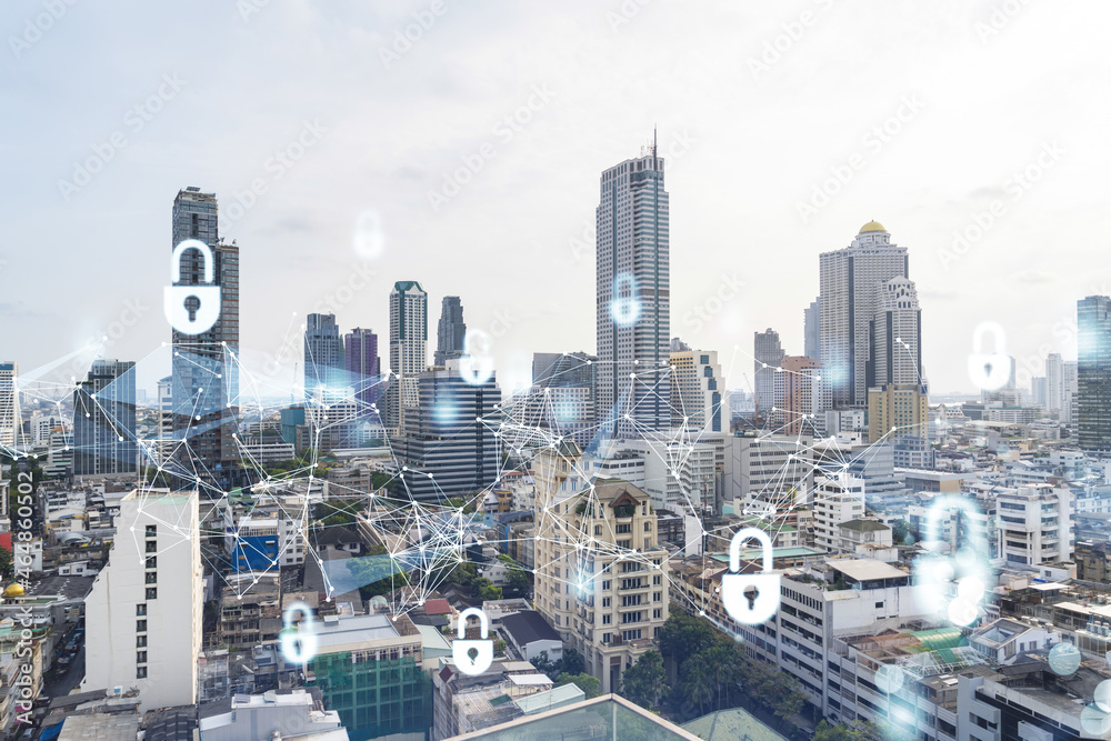 Padlock icon hologram over panorama city view of Bangkok to protect business in Southeast Asia. The concept of information security shields. Double exposure.