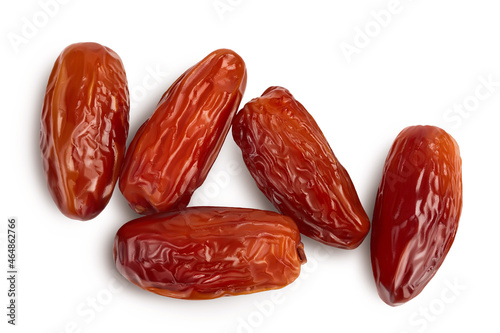 Dates isolated on white background with clipping path. Top view. Flat lay