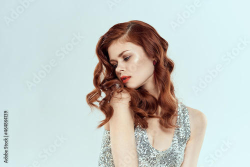 woman in silver dress fashionable hairstyle decoration Glamor posing