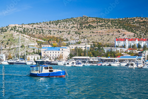 Motor boat goes at the bay of Balaklava, summer day
