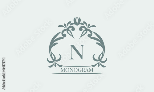 Graceful monogram in gray tones with the inscription and the letter N. Exquisite sign, logo of a restaurant, boutique, hotel, business