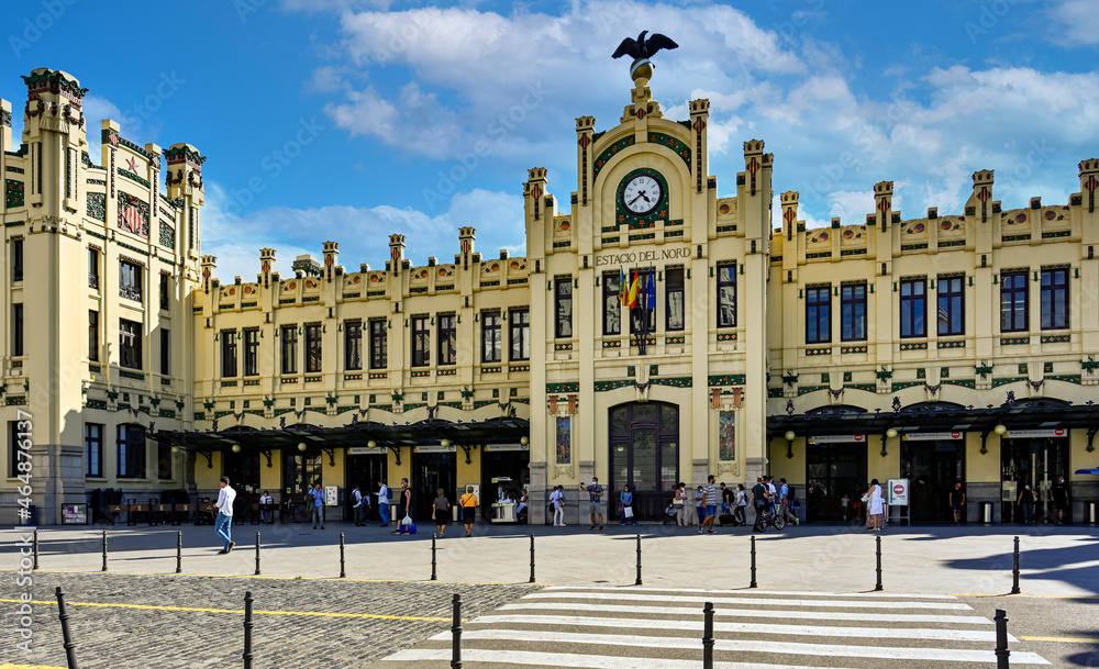 Street view of historic train station building in Valencia, Spain.